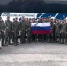 Минобороны показало видео, где вернувшиеся военные развернули флаг РФ - Газета Знамя труда